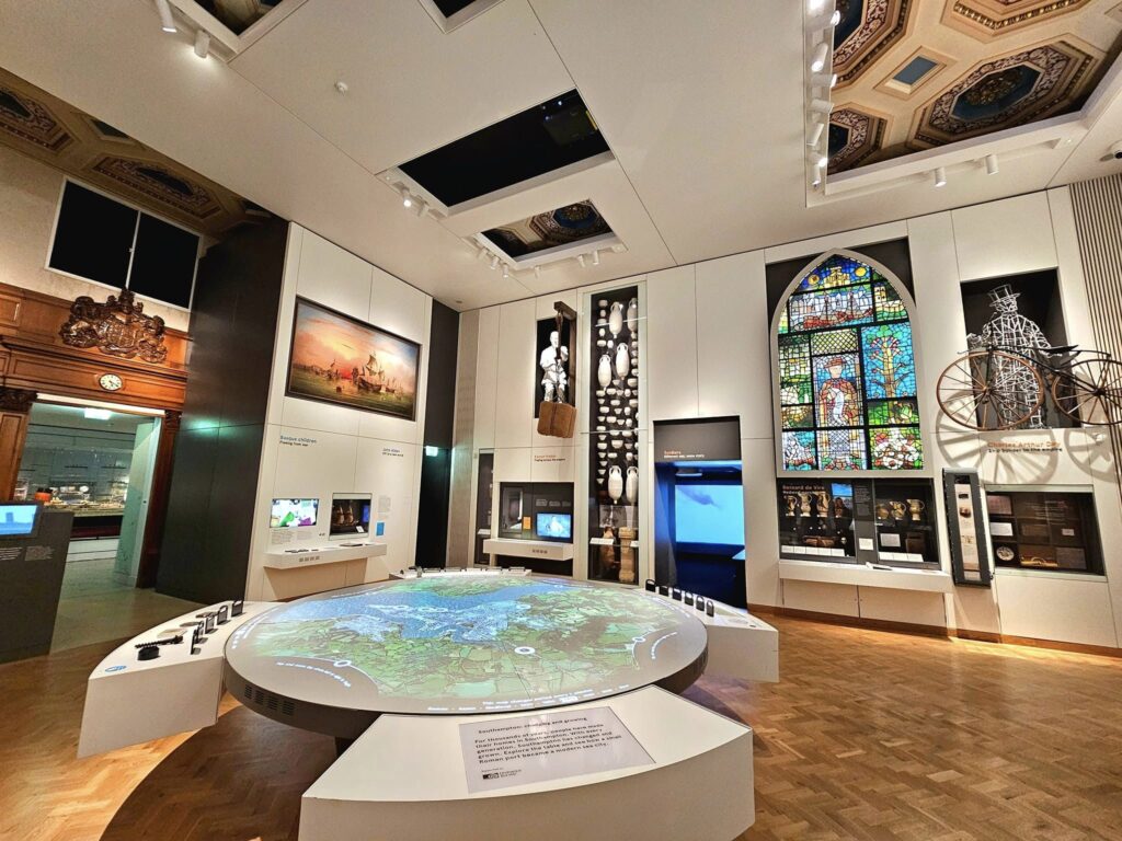 MSC Cruises, Cruise Travelers, MSC Preziosa, Southamton, London, United Kingdom | Visitors exploring the Southampton Titanic Museum, showcasing Titanic artifacts and exhibits, highlighting maritime history and the impact on Southampton heritage.